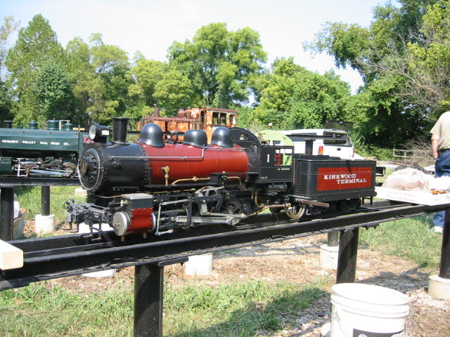 A live steam locomotive on the Missouri Live Steamers track