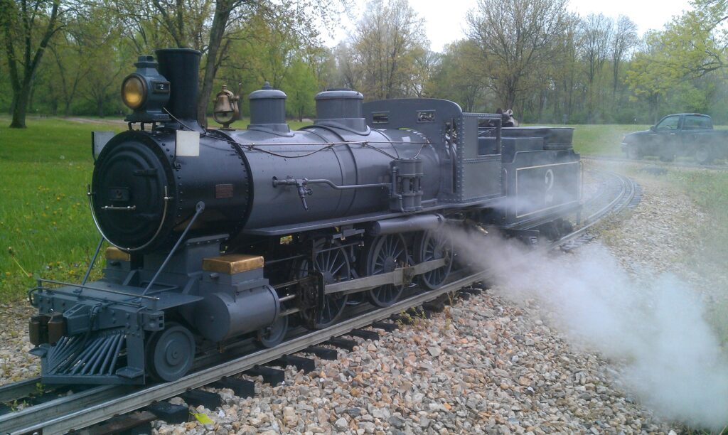A Missouri Live Steamers member operating a locomotive